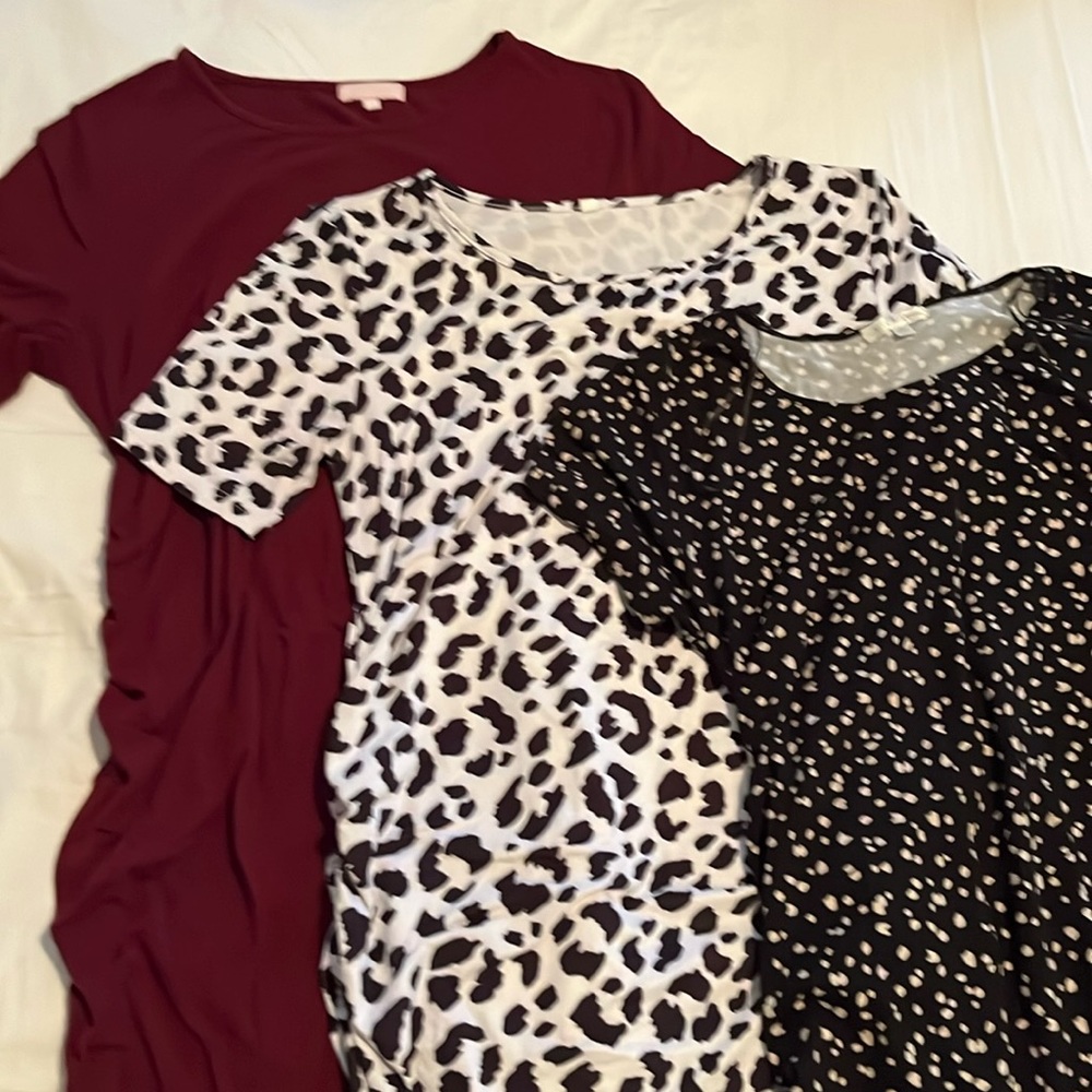 Three knee length, body con style maternity dresses